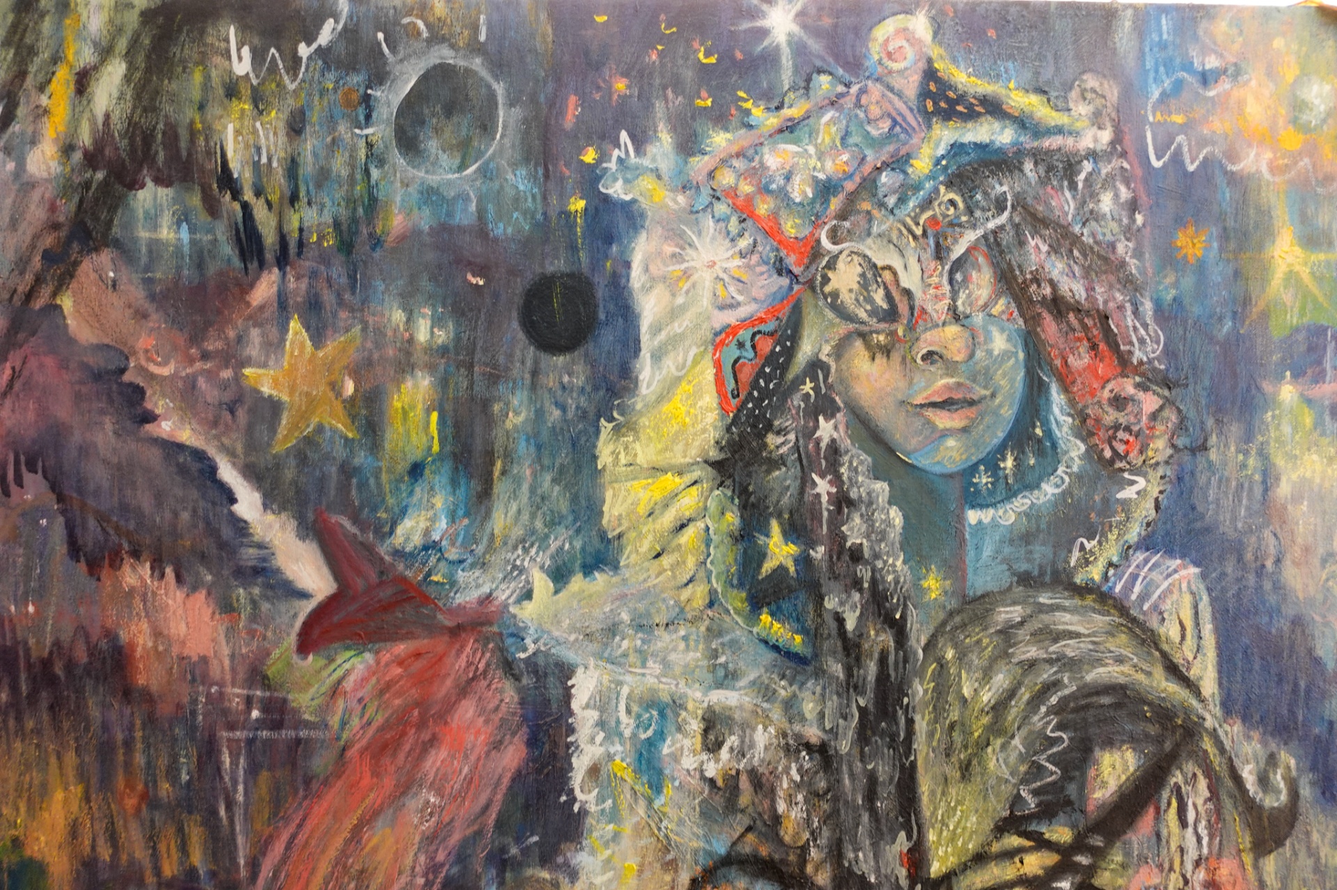 ZANCHES in the studio, seated in front of a large mixed-media painting
